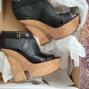Black and cork platform shoes